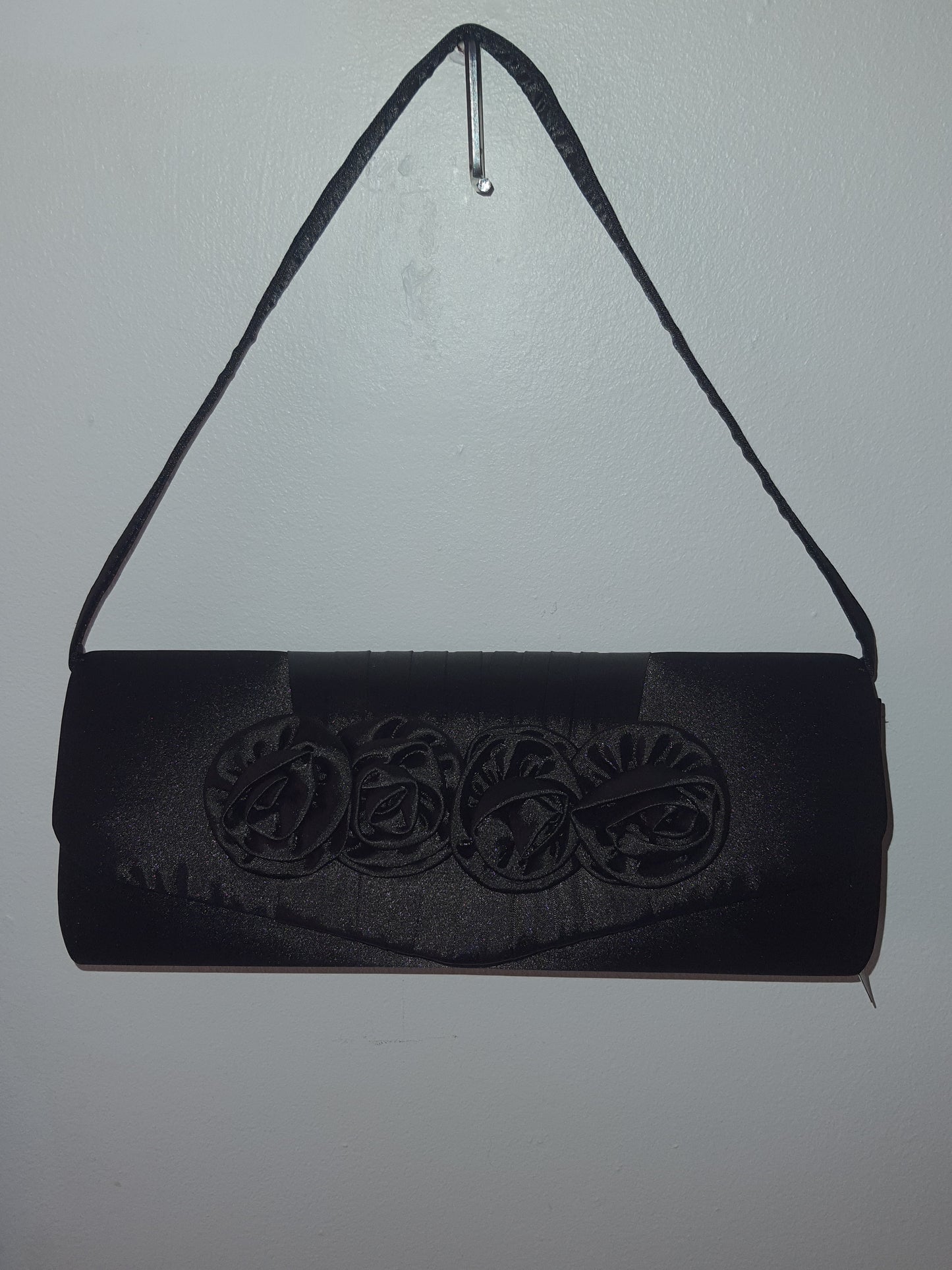 Pochette de soirée 4 fleurs.